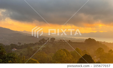 Stunning view on mount Abang and lake Batur at sunrise Stunning view on mount Abang and lake Batur at sunrise 105677037