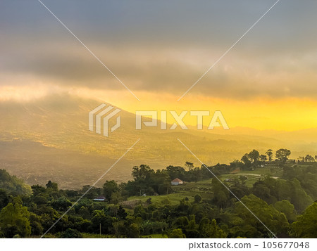 Stunning view on mount Abang and lake Batur at sunrise Stunning view on mount Abang and lake Batur at sunrise 105677048