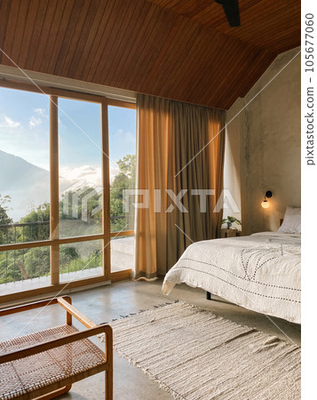 Panoramic windows in bedroom with stunning view Panoramic windows in bedroom with stunning view 105677060