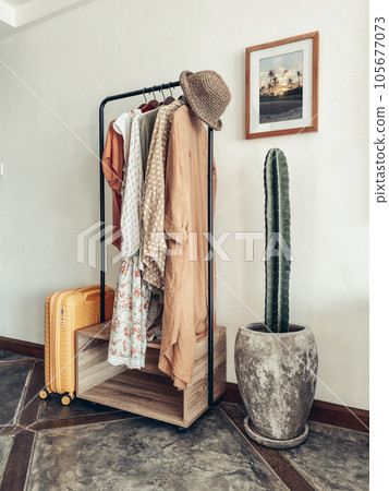 Clothes rack with women's summer clothes 105677073