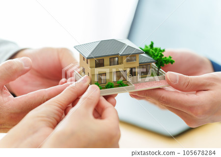 people with real estate models people with real estate models 105678284