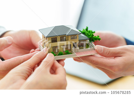 people with real estate models people with real estate models 105678285