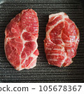 Raw meat steak on a grilled reflex pan 105678367