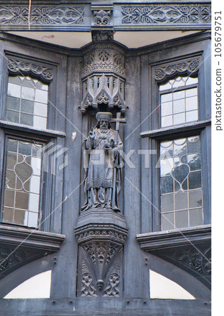 Carved figure on the wall of a building in Chester, England. Carved figure on the wall of a building in Chester, England. 105679751