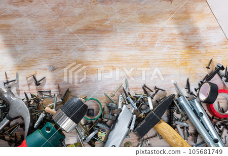 Set of hand tools on wooden background Set of hand tools on wooden background 105681749