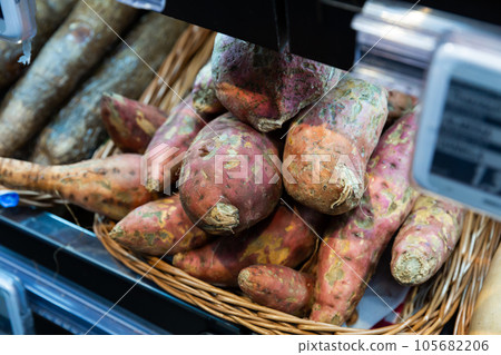 Raw sweet potatoes Raw sweet potatoes 105682206