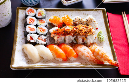 Combined sushi - california, nigiri, variado closeup 105682315