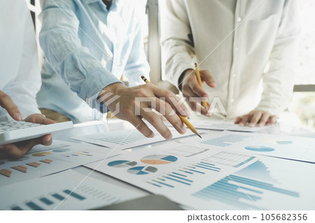 Team work process. Young business managers crew working with new startup project. Team work process. Young business managers crew working with new startup project. 105682356