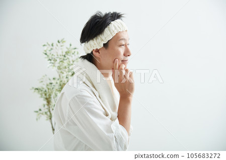man washing face man washing face 105683272