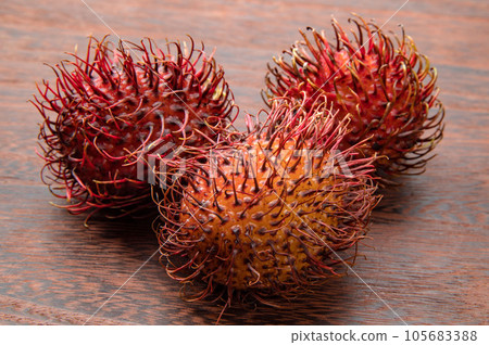 Rambutan, tropical fruit 105683388