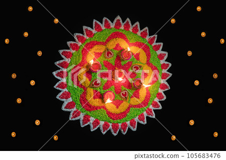 Clay diya lamps lit during diwali celebration, Diwali, or Dipawali, is India's biggest and most important holiday. 105683476