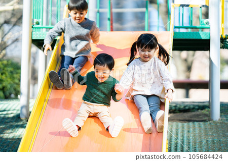 Children playing in the sandbox 105684424