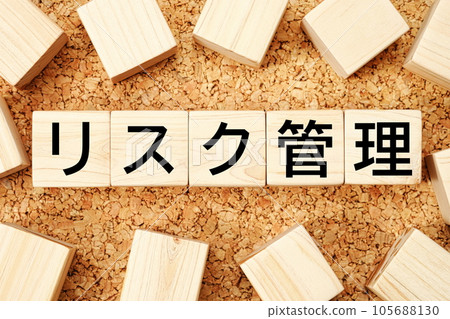 Risk management Wooden cube business term material 105688130