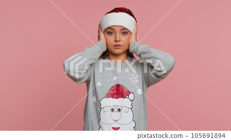 Annoyed irritated young woman covering ears, gesturing No avoiding advice ignoring noise loud voices 105691894