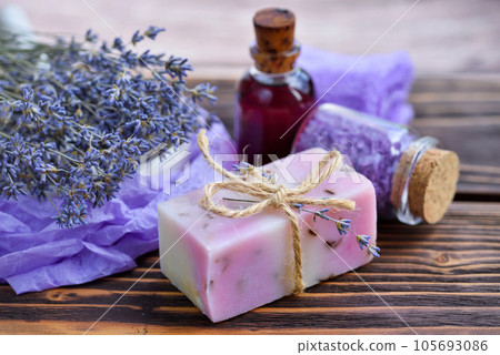 Lavender spa products on wooden table. Body care products with lavender Lavender spa products on wooden table. Body care products with lavender 105693086