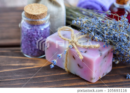 Lavender spa products on wooden table. Body care products with lavender Lavender spa products on wooden table. Body care products with lavender 105693116