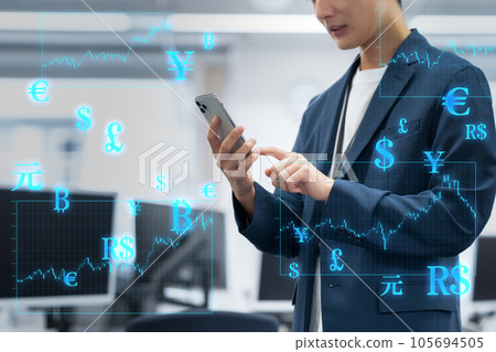 Young male engineer working by operating a smartphone in the office Young male engineer working by operating a smartphone in the office 105694505