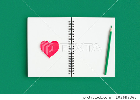 Notebook with pencil, red heart. Open notebook on green emerald color background, spiral notepad. Top view. Notepad with blank white page for write, office flat lay. Copy Space. Valentine Day, Love Notebook with pencil, red heart. Open notebook on green emerald color background, spiral notepad. Top view. Notepad with blank white page for write, office flat lay. Copy Space. Valentine Day, Love 105695363