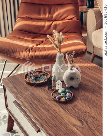 Decorative lava stone vases with dry flowers and healing crystals Decorative lava stone vases with dry flowers and healing crystals 105695430