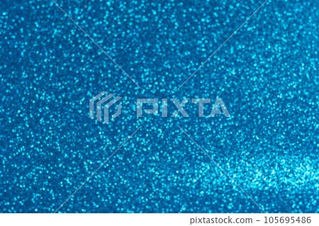 An abstract blue background with sparkle lights and bokeh. 105695486