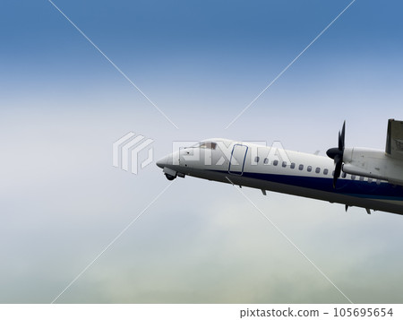 Passenger plane flying in cloudy sky Passenger plane flying in cloudy sky 105695654