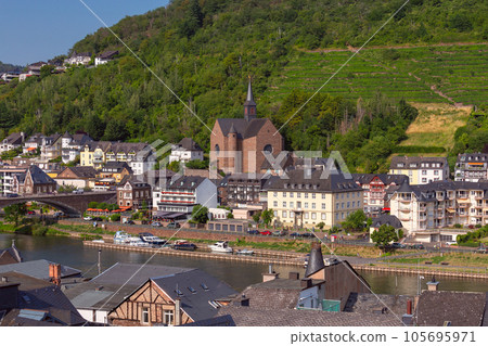 City embankment in the old medieval town of Cochem on a sunny day. Germany. City embankment in the old medieval town of Cochem on a sunny day. Germany. 105695971