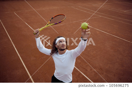 High angel view on man tennis player serving ball 105696275