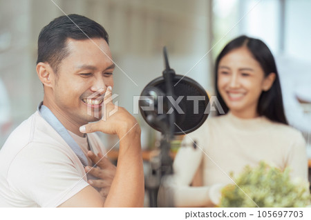 Podcaster is interviewing a guest about the content topic of LGBTQIA. Podcast concept Podcaster is interviewing a guest about the content topic of LGBTQIA. Podcast concept 105697703