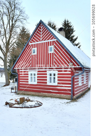 Beautiful wooden cottage during winter Beautiful wooden cottage during winter 105699028