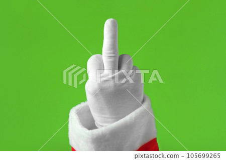 Santa Claus Showing a Middle Finger on Chroma Key. Hand in White Glove Making Fuck Gesture Isolated On Green Screen Background. Fucking 2022 Year. Concept of Bad New Year, Christmas. Harsh emotion. 105699265