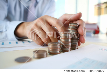 Hand businessman putting pin money Hand businessman putting pin money 105699877