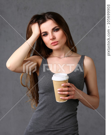 Beautiful young smiling woman hold in arms Beautiful young smiling woman hold in arms 105699908