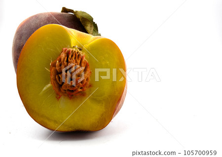 half a peach on a white background half a peach on a white background 105700959