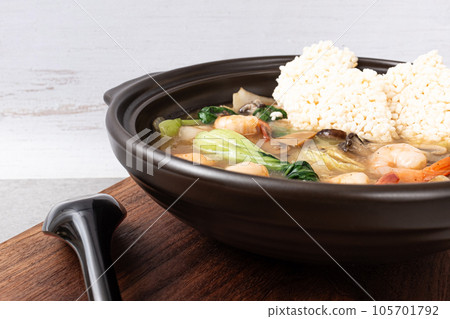 Seafood Fried Glutinous Rice Soup with Seafood and Vegetables and Fried Glutinous Rice Seafood Fried Glutinous Rice Soup with Seafood and Vegetables and Fried Glutinous Rice 105701792