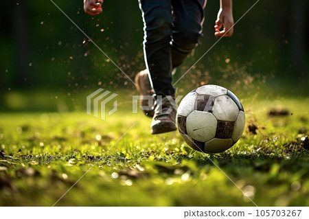 Child a boy is playing soccer. Child a boy is playing soccer. 105703267