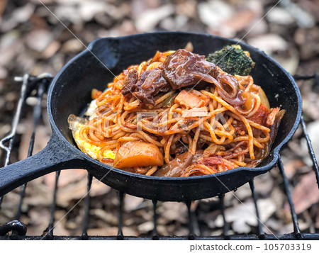 Skillet making beef stew pasta Skillet making beef stew pasta 105703319