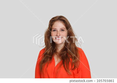 Portrait of happy pretty woman with ginger hair smiling on white background Portrait of happy pretty woman with ginger hair smiling on white background 105703861