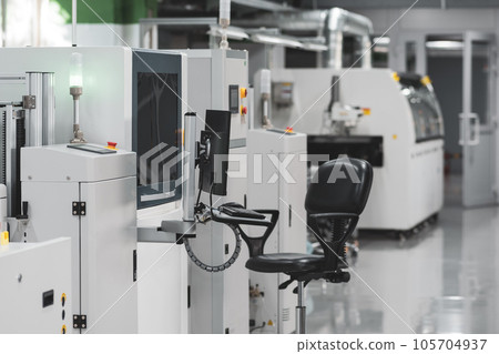production line for printed circuit board manufacturing mounted in workshop 105704937
