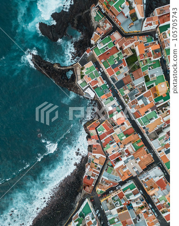 blue water ocean shore, small cozy village Punta Brava, Tenerife, Canary aerial 105705743