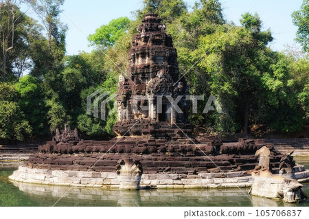 Jayatataka monument, originally a Hindu royal temple now adorned with Buddhist symbols, situated on an island in baray, reminiscent of the sacred Himalayan lake Anavatapta. 105706837