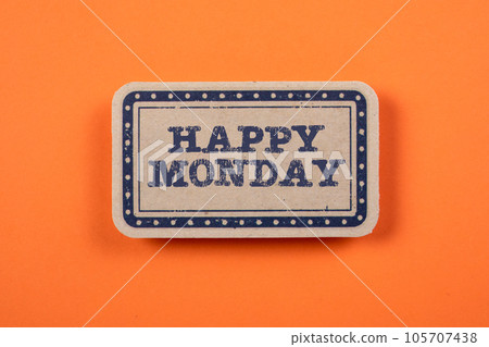 Happy Monday. Cardboard sticker with text on an orange background 105707438