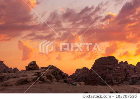 colorful sunset sky, rocks in Little Petra, Jordan colorful sunset sky, rocks in Little Petra, Jordan 105707550