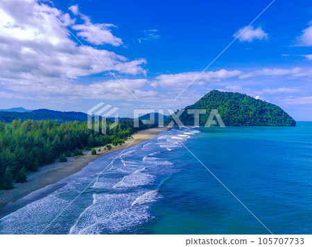 The beauty of Babah Ie Beach, Aceh with trees on the sandy beach against the blue sky The beauty of Babah Ie Beach, Aceh with trees on the sandy beach against the blue sky 105707733