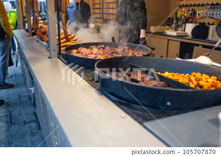 Traditional meats stand in Krakow at street food vendor market, grilled satay. food festival. 105707870