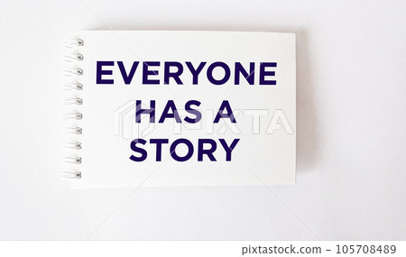 Everyone Has A Story text in notepad, white background 105708489