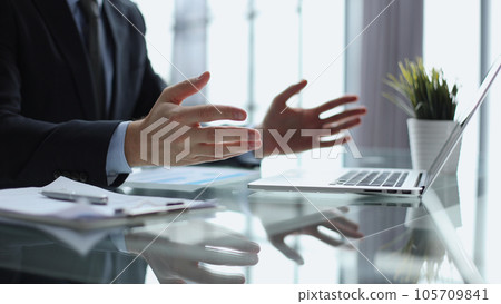 businessman finger typing on computer keyboard in office 105709841