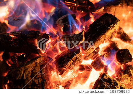 close up photo of a burning fire close up photo of a burning fire 105709983