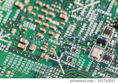 Close up of electronic components on the motherboard, microprocessor chip Close up of electronic components on the motherboard, microprocessor chip 105710037