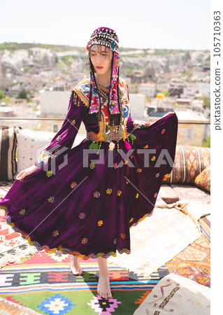 beautiful girl dressed in Turkish national clothes beautiful girl dressed in Turkish national clothes 105710363