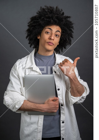 Young freelancer looking thoughtful and focused Young freelancer looking thoughtful and focused 105710807